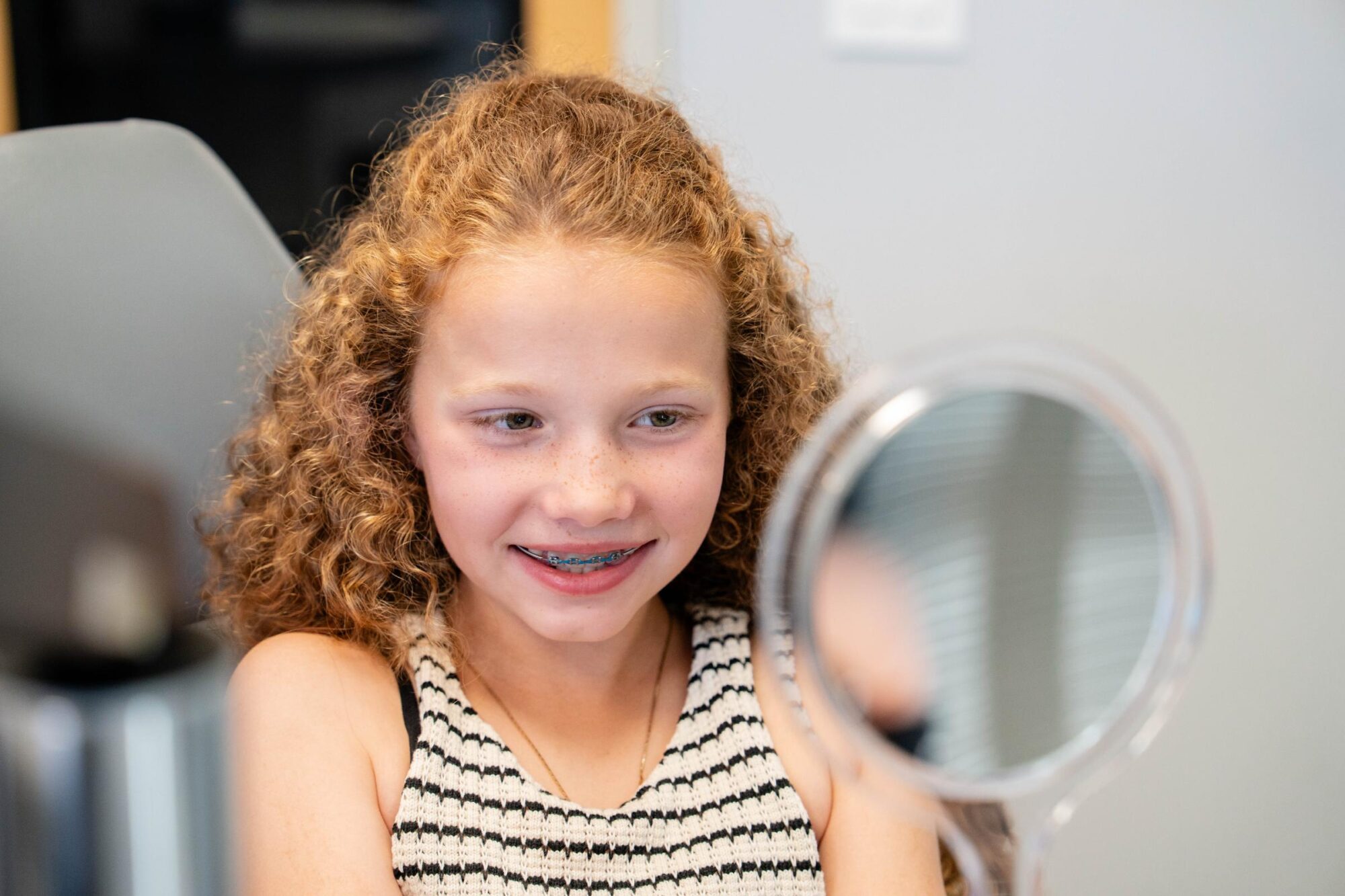 teen girl smiling during orthodontic visit