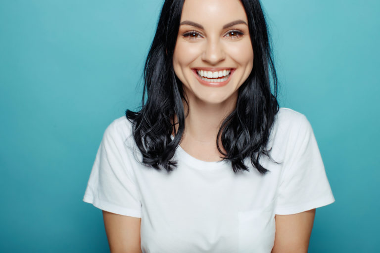 smiling patient with clear aligners beaverton or