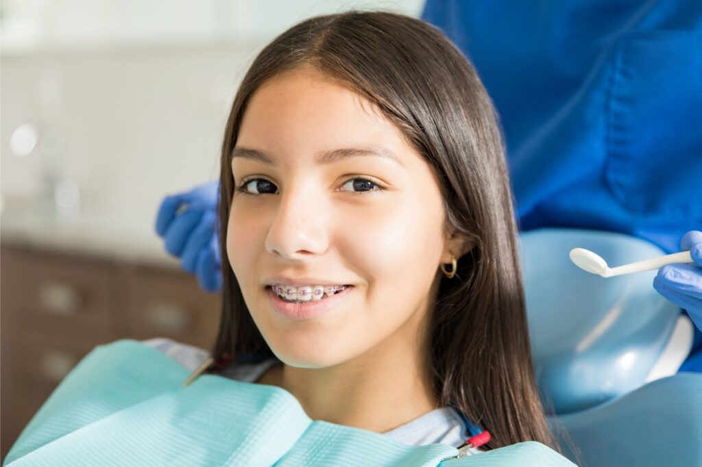 Patient smiling after braces treatment in Portland OR orthodontic office
